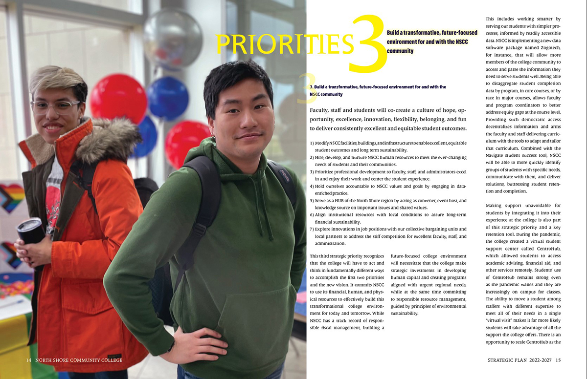 Spread with full page photo on left of two standing students in fall jackets and text on right side.